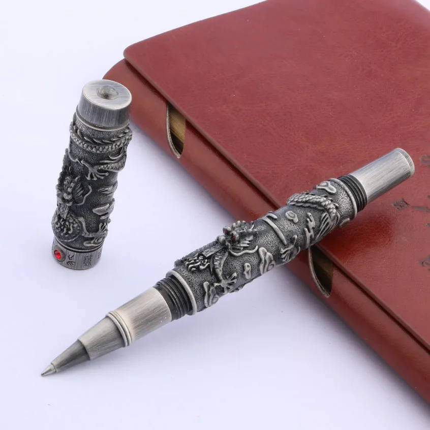 Серебряный дракон ЦЗИНЬХАО, вырезанный на шариковой ручке с красным бриллиантом.